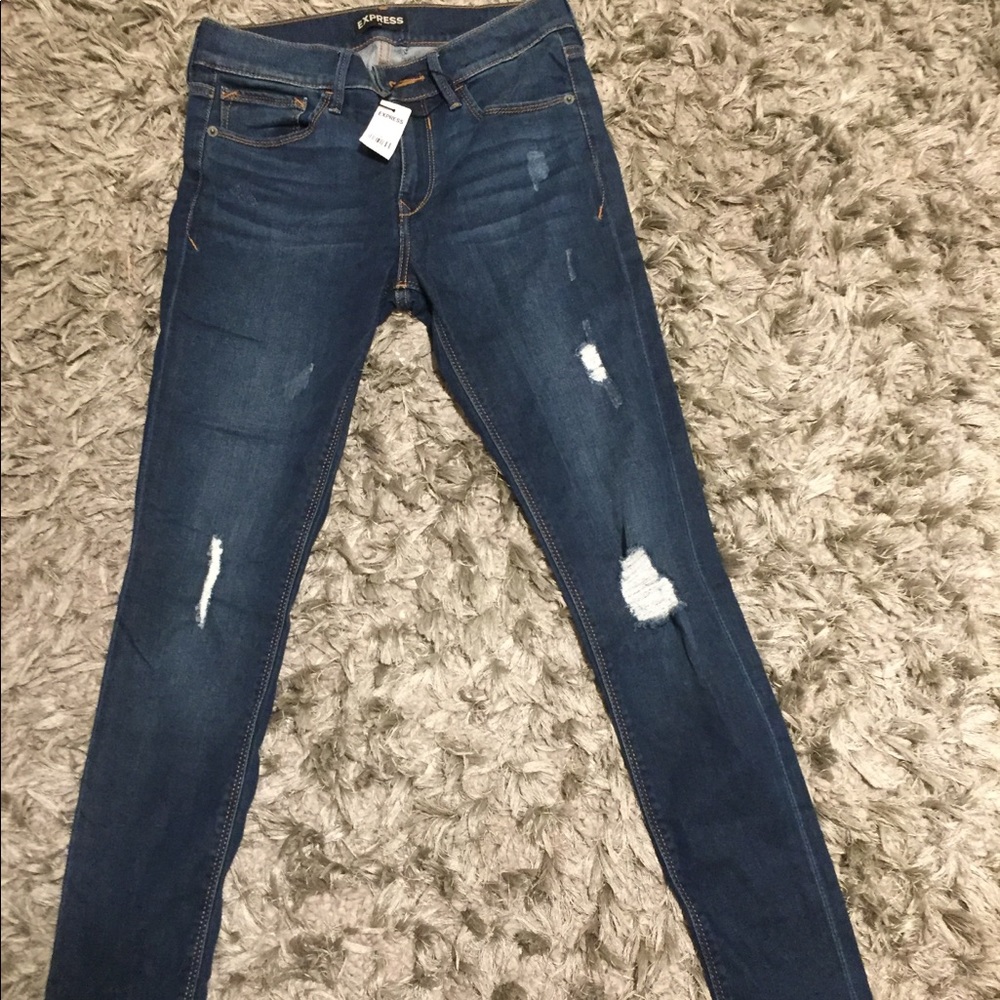 Jean pants with rips in it